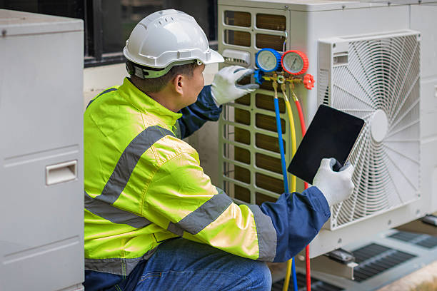 Professional Hvac technician working in Hills, IA